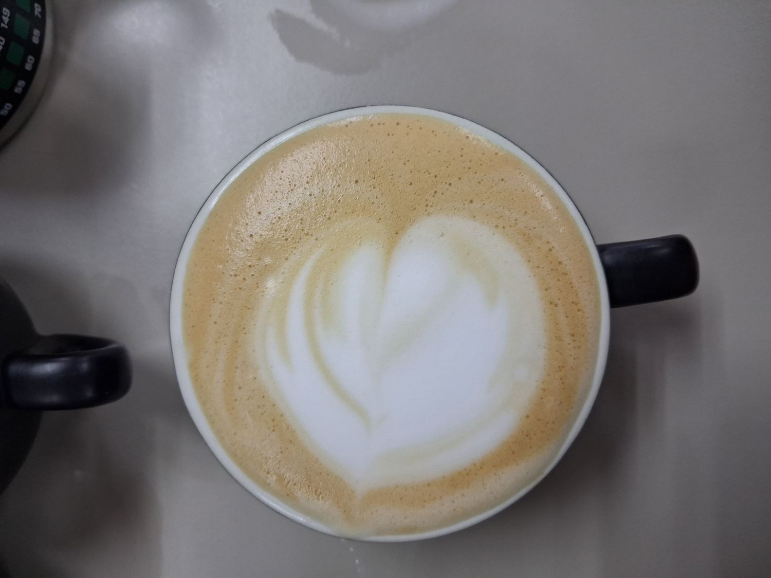 Cup of coffee with latte art